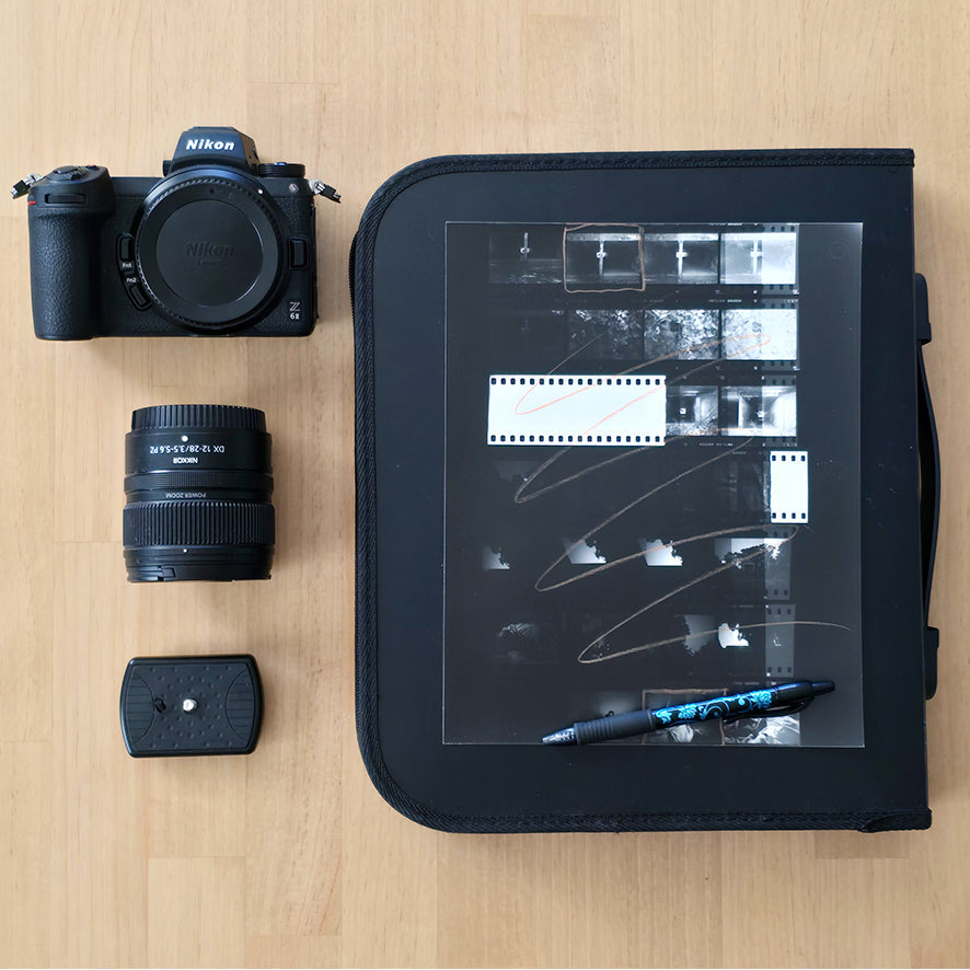 Camera and photographic print representing the Photographic Studies collection of digital photographic works.