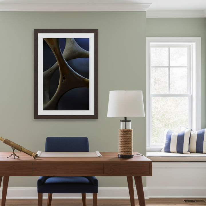 Dark I abstract geometric photographic print displayed in a modern blue and wood interior setting.